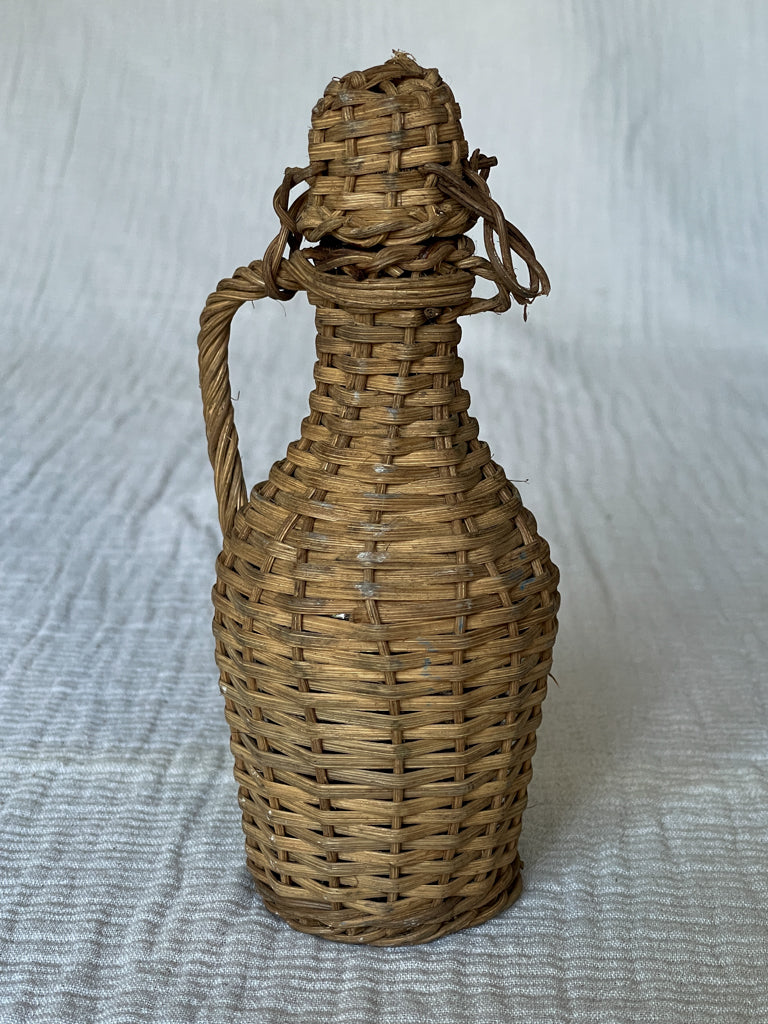 Vintage Small Wicker Handled Styling Bottle
